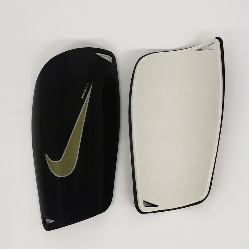 Caneleira Nike